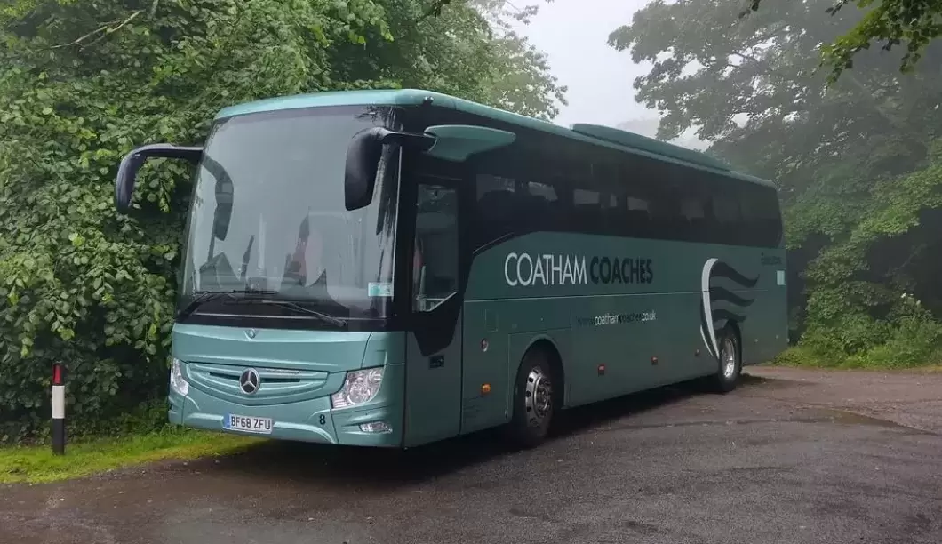 Coathams coach in rain
